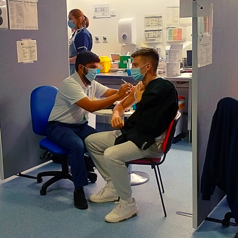 Norwich City FC stars visit our vaccination clinic to get turbo-boosted