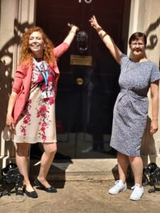 Kim and Liz outside the famous No.10 Downing street door